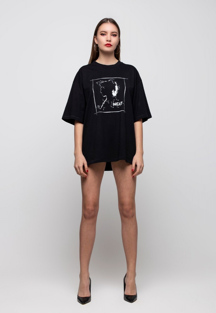 Oversized black t-shirt with a minimalist woman silhouette print by Neat Atelier